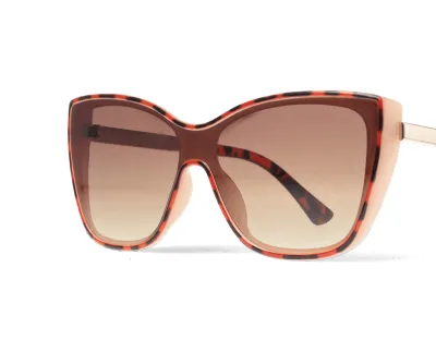 Brune oversized cat-eye-solbriller i skildpaddemønster